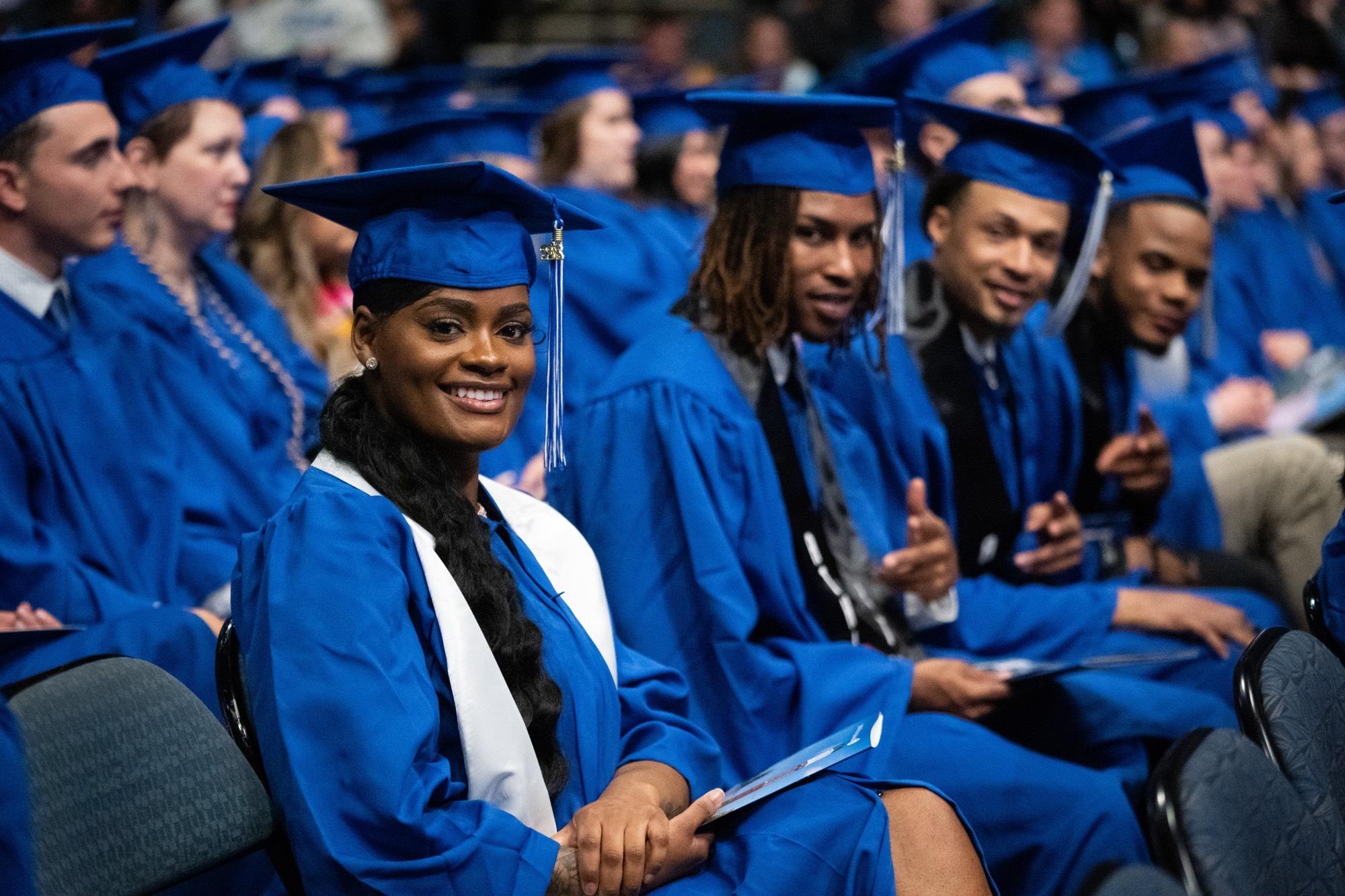 students sitting at Commencement